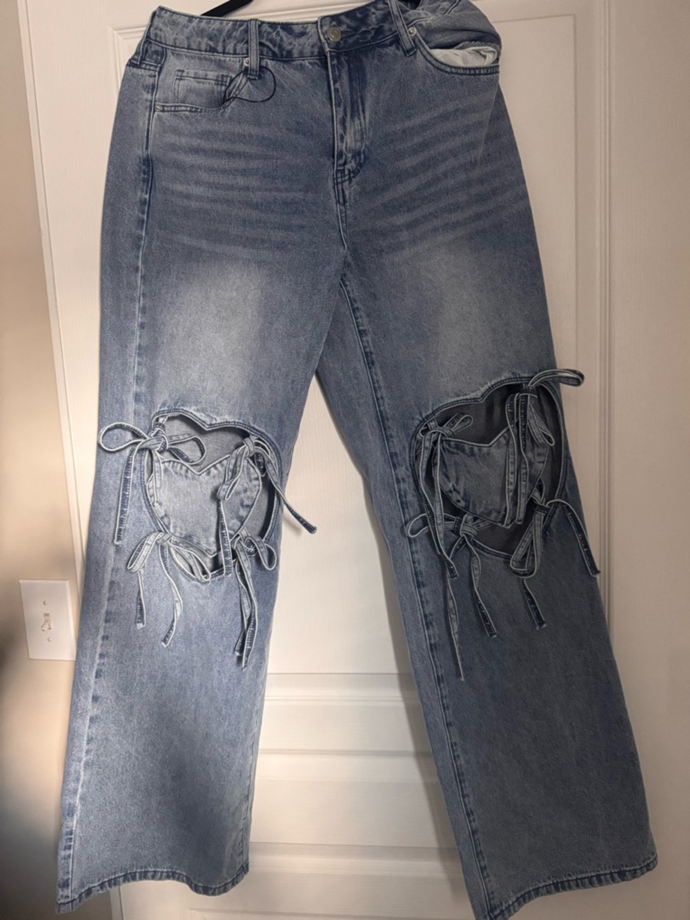 Fashion Nova Light Blue Distressed Tie-Knot Flare Jeans